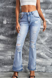 Distressed Mid Waist Ripped Flare Jeans